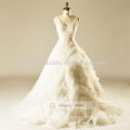 Weiße Spitze V-line Kuchen-Hochzeits-Kleid mit den Bügeln, die Ballkleid schleppen